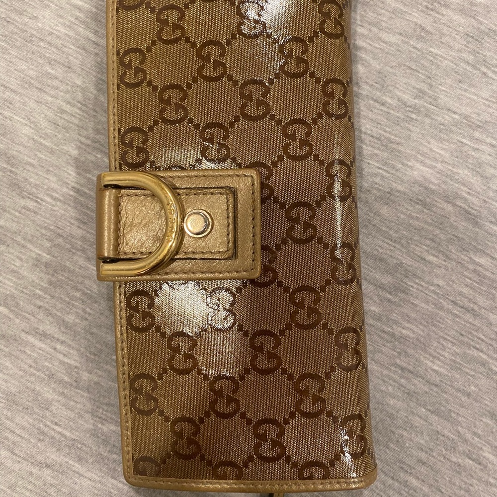 Gold Gucci wallet
